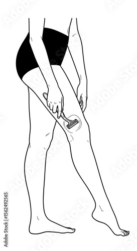 Woman shaving her leg with razor in preparation for smooth skin