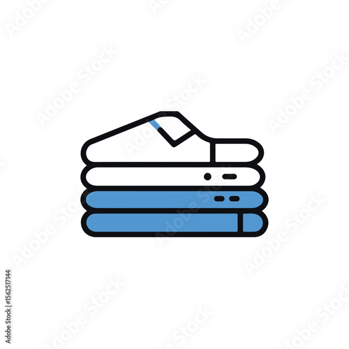 Clean clothes neatly folded in a stack.