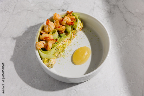 Russian salad with shrimps and pear