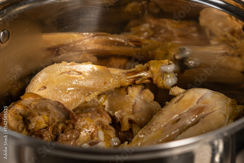 Chicken stir-fried in olive oil in a pan