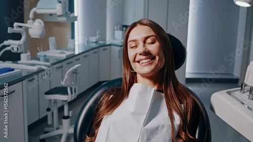 Smiling woman relaxed in modern dental clinic during checkup