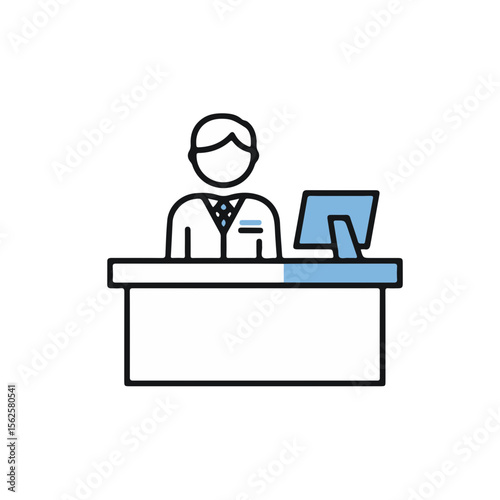 Hotel concierge standing at reception desk with computer screen  