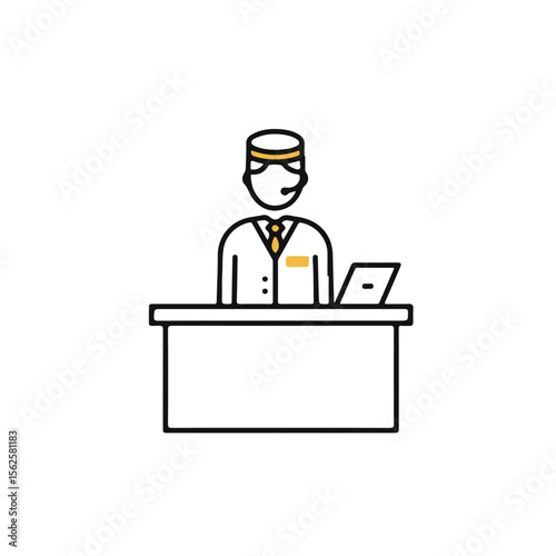 Hotel concierge standing behind front desk with laptop and headset  