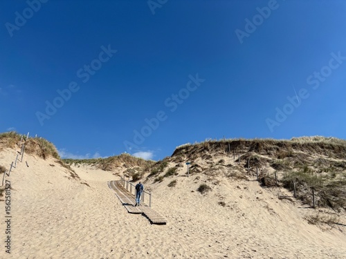 dunes with beach grass, and walkway