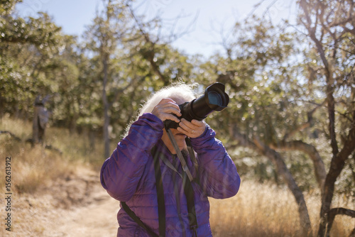 Photographer Capturing Nature Close-Up