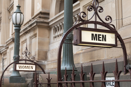 Historical Signage Indicating Men Restroom Facilities