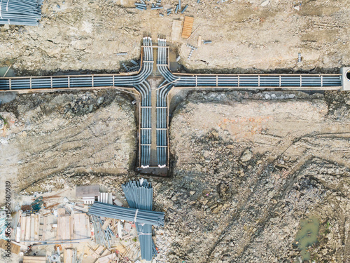 Aerial View of Construction Pipes for Town Road Building photo