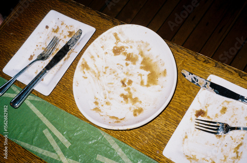 Empty plates at restaurant after eating a meal