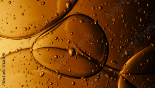Abstract Composition of Bubbles in Amber-Colored Liquid Background