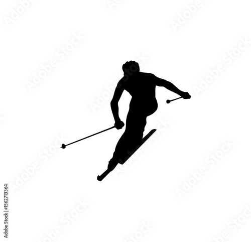 Silhouette of a skier in motion, gliding down a snowy slope.