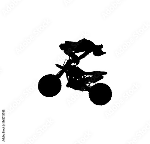 Silhouette of a motocross rider performing a trick in the air on a dirt bike.
