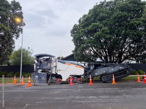 Road repair machines parked on road