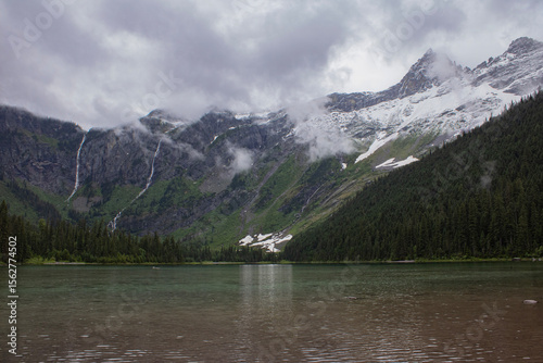 avalanche lake in glacier national park during a rain storm