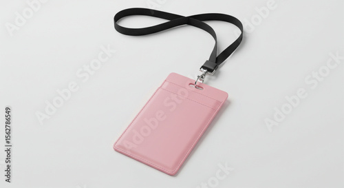 Light pink leather id card holder on black lanyard