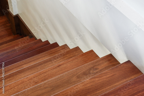 Wood staircase inside contemporary white modern house,stairs apartment architecture design house interior modern,stairs and railing.