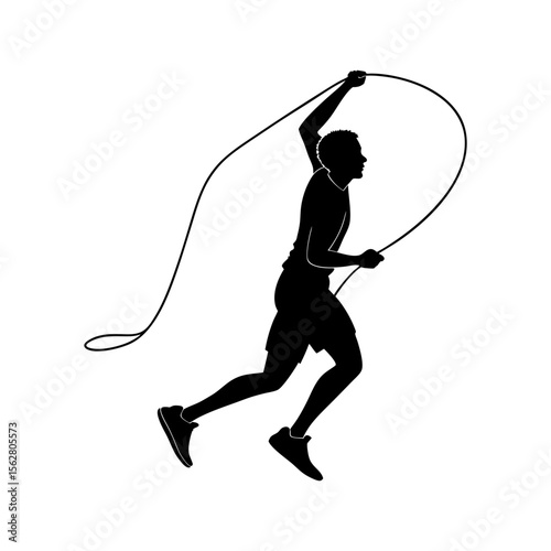 Silhouette of a fit man actively jumping rope as part of his cardio workout routine