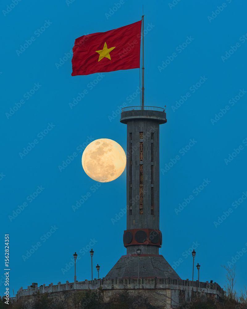 Majestic flag tower in Lung Cu, Ha Giang, Vietnam against a vibr Majestic flag tower in Lung Cu, Ha Giang, Vietnam against a vibr