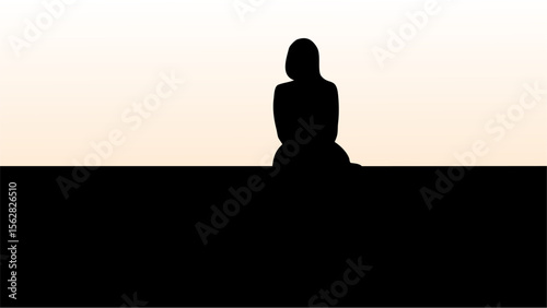 Silhouette of a person sitting with their back turned against a light background on a dark surface