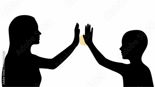 Silhouette of mother and child high fiving each other in a gesture of affection and happiness shown here