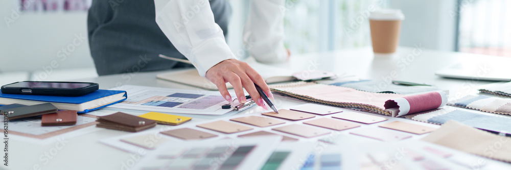 Fototapeta premium Architect Asian Woman Hand Design Material Palette, Floor Plan, Selection Process for Home Interior, Renovation Project and Color Scheme Inspiration