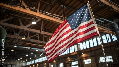 American Flag Hanging Inside Industrial Warehouse with Wooden Beams and Natural Light
