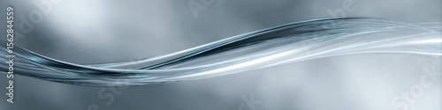 Abstract silver wave with light reflections and soft blurred background in a horizontal format