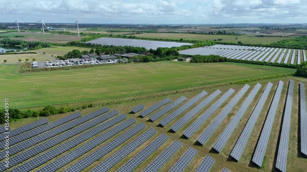 Aerial drone view of photovoltaic solar power plant station renewable energy electricity Newark England UK sub station pylons Aerial drone view of photovoltaic solar power plant station renewable energy electricity Newark England UK sub station pylons