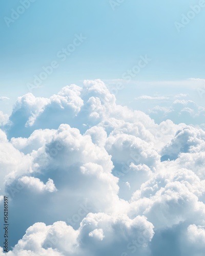 High-angle view of fluffy white clouds against a vibrant blue sky