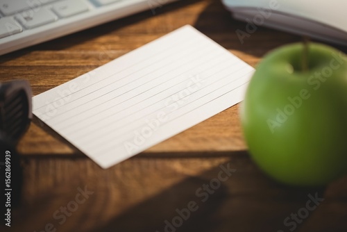 Keyboard and mouse by apple on table
