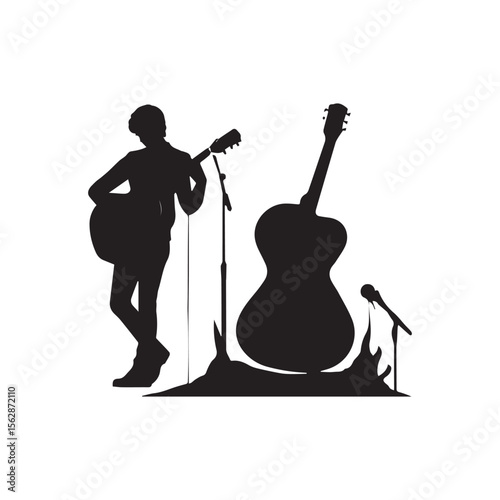 Silhouette of Man Playing Acoustic Guitar

