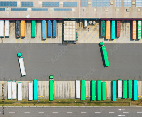 Logistics Warehouse with Colorful Cargo Containers