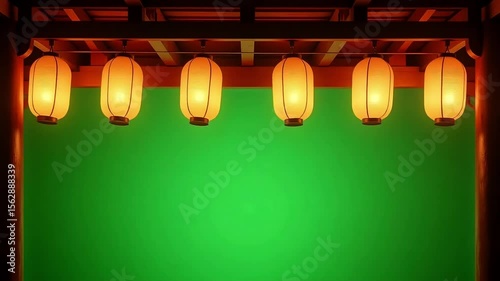 Traditional japanese paper lanterns hanging on wooden frame with glowing light and green screen background for cultural design
