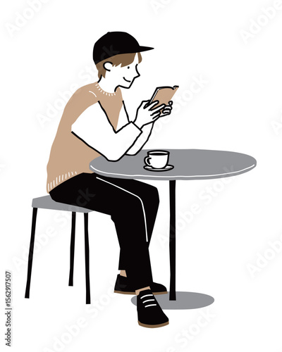 カフェでコーヒーを飲みながら読書をする男性2