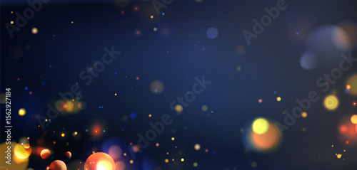 Festive bokeh lights on dark blue background - gold yellow orbs floating with bright sparkles. Blurred glowing circles and shimmering dots for celebration wallpaper or holiday party backdrop design.