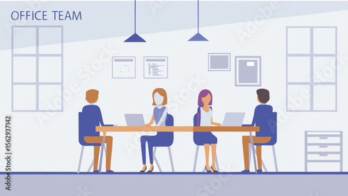 Office team working together at a long desk with laptops in a bright office with hanging lights above them