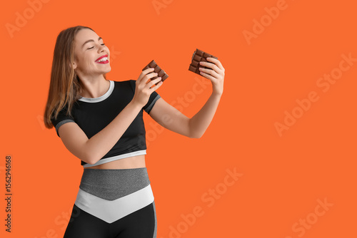 Young woman with chocolate ...