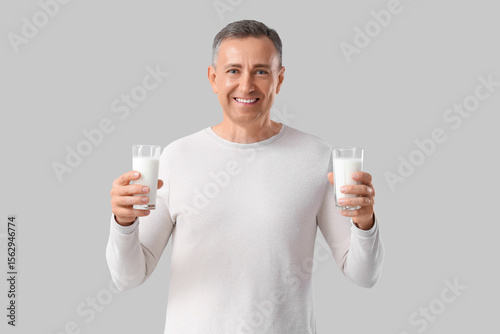 Mature man with glasses of ...