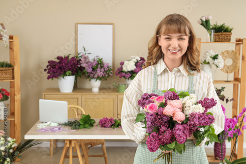 Female florist holding beau...