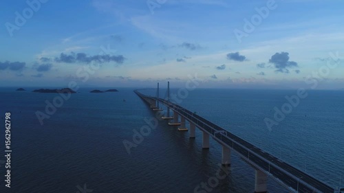 Hong Kong Zhuhai Macao Bridge aerial views showcasing engineering marvel over water at twilight