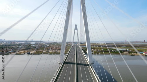 Crossing Liaohe Bridge in Yingkou City offers stunning views of notable landmarks and riverside landscapes