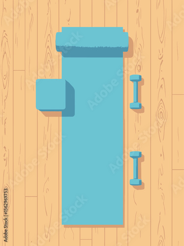 aerial shot of yoga mat with neatly placed yoga block, towel, and small dumbbells on a wooden floor, minimalist composition