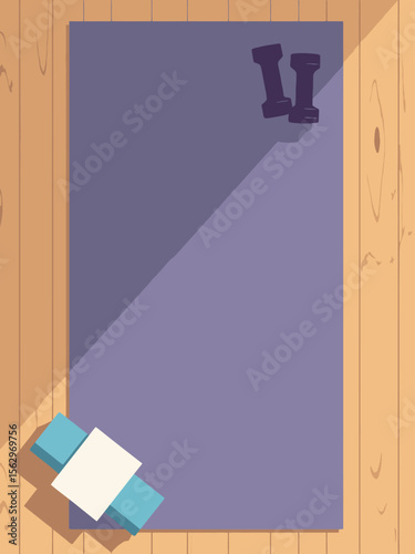aerial shot of yoga mat with neatly placed yoga block, towel, and small dumbbells on a wooden floor, minimalist composition