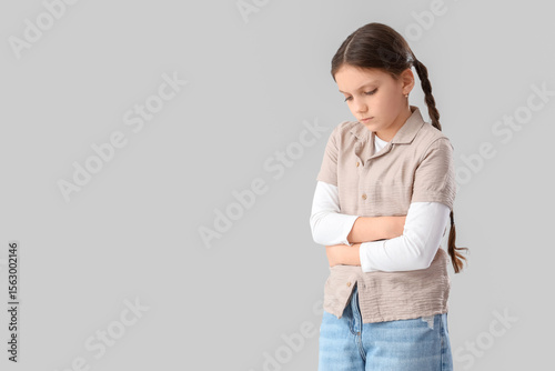 Cute girl suffering from be...