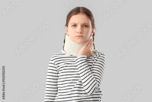 Cute girl in cervical colla...