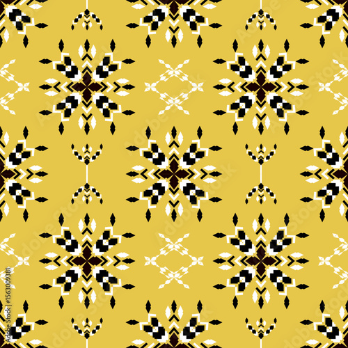 Tribal vector ornament. Seamless African pattern on a yellow background. Ethnic carpet with chevrons. Aztec style. Geometric mosaic on the majolica tile. Ancient interior. Modern rug. Kente Cloth.