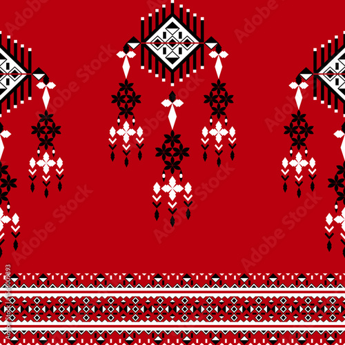 Geometric ethnic boho on a red background seamless pattern. Tribal pattern with steering wheel. Folk motif. Textile rapport. Native ethnic pattern. Wallpaper, tiles, carpet, and backdrop.