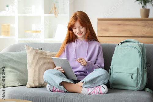 Cute ginger girl with backp...