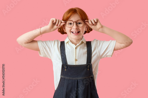 Cute ginger girl in stylish...