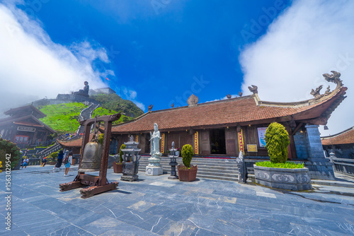 Buddhist temple on top of a foggy mountain. Fansipan mountain Sapa, Lau Cai, Vietnam