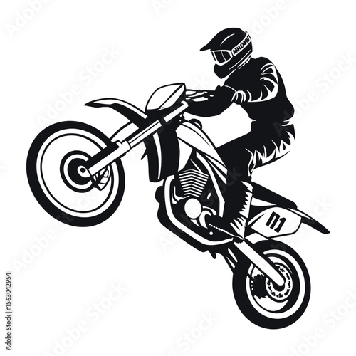 A motor bike rider riding fast in a cornering way